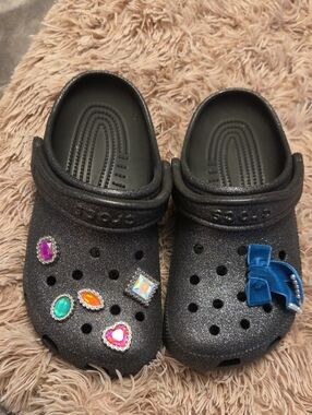 Ladies black sparkle crocs with extra jewel jibbits